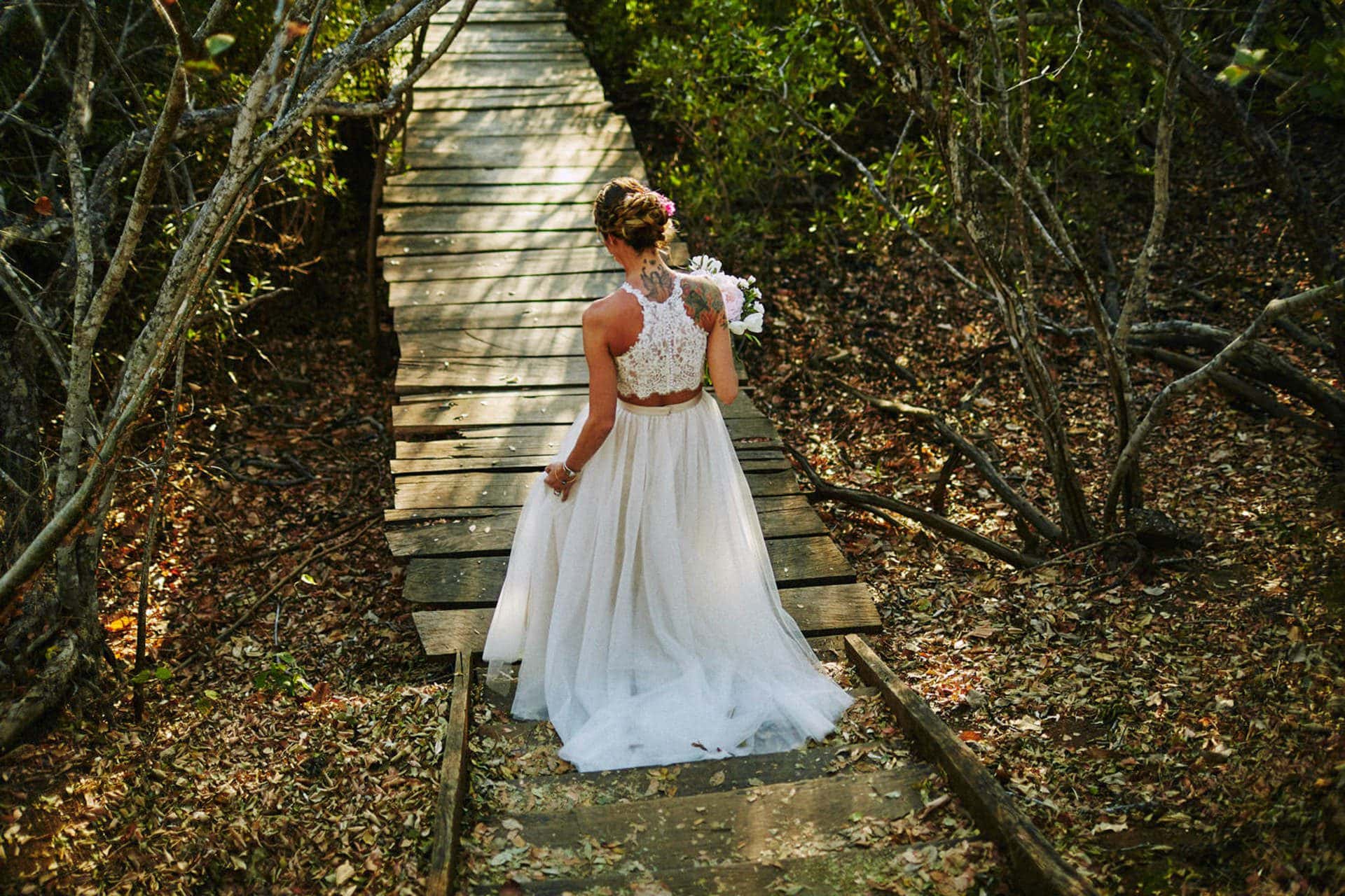 bride walking to the ceremony on beach wedding in costa rica wedding guide January