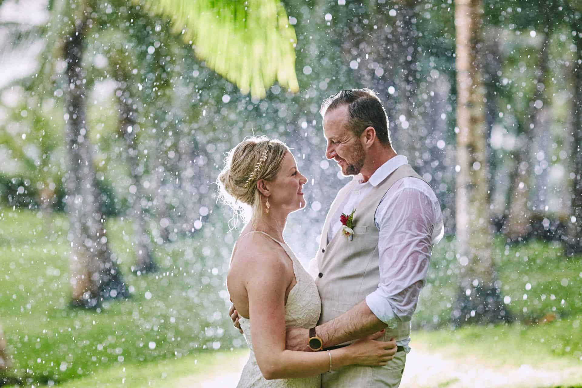 bride and groom photo session under the rain in costa rica wedding