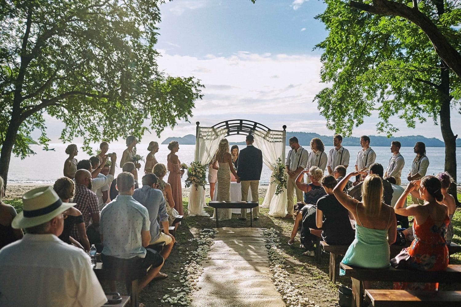 Cc beachfront papagayo wedding photographer capturing a bride walking to the ceremony