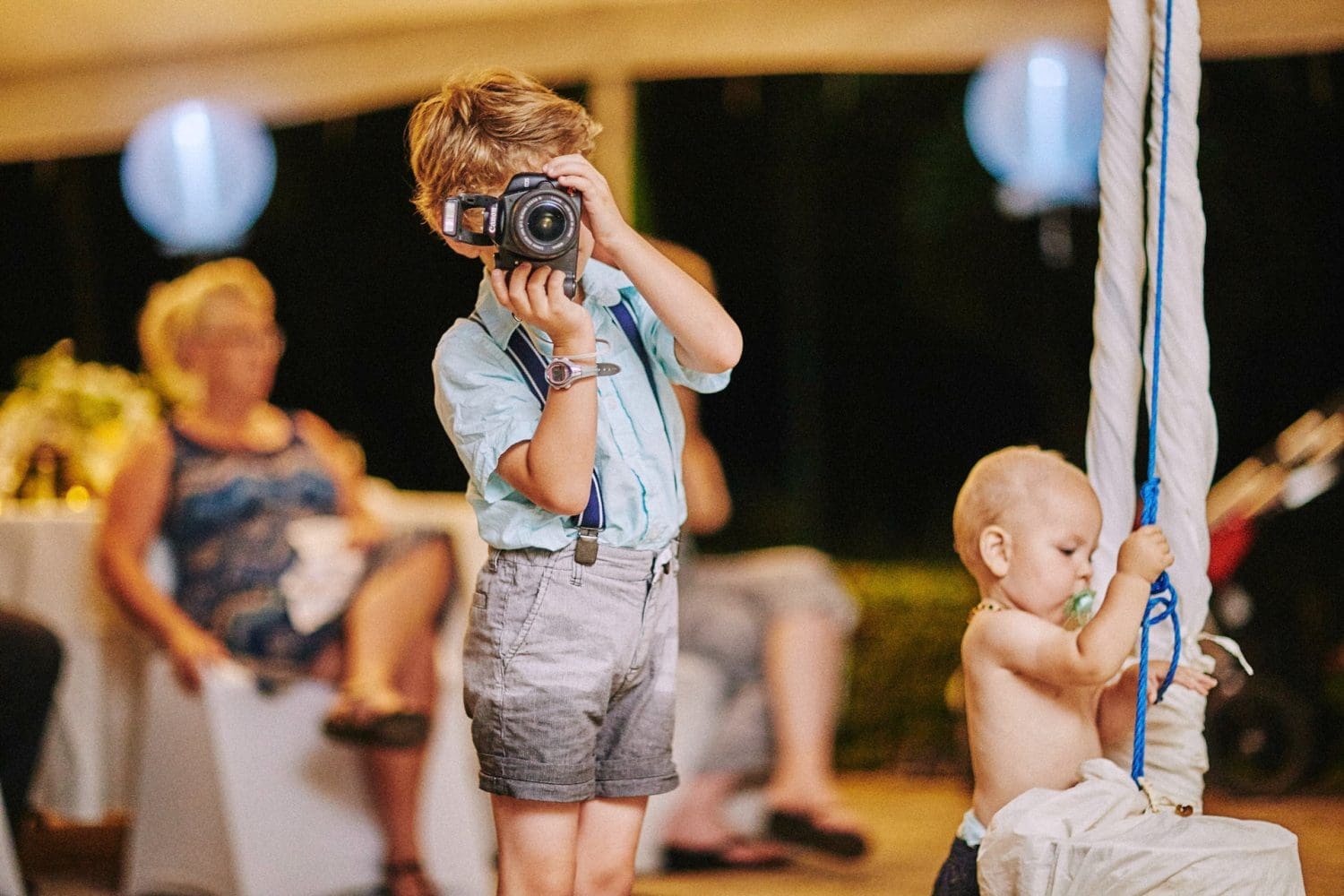 Cc beachfront papagayo wedding photographer capturing guests taking pictures 