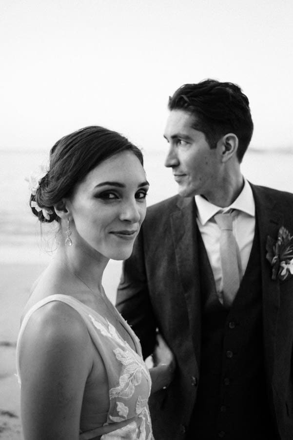 Black and white portrait of newlyweds during their wedding at Conchal Beach, Costa Rica