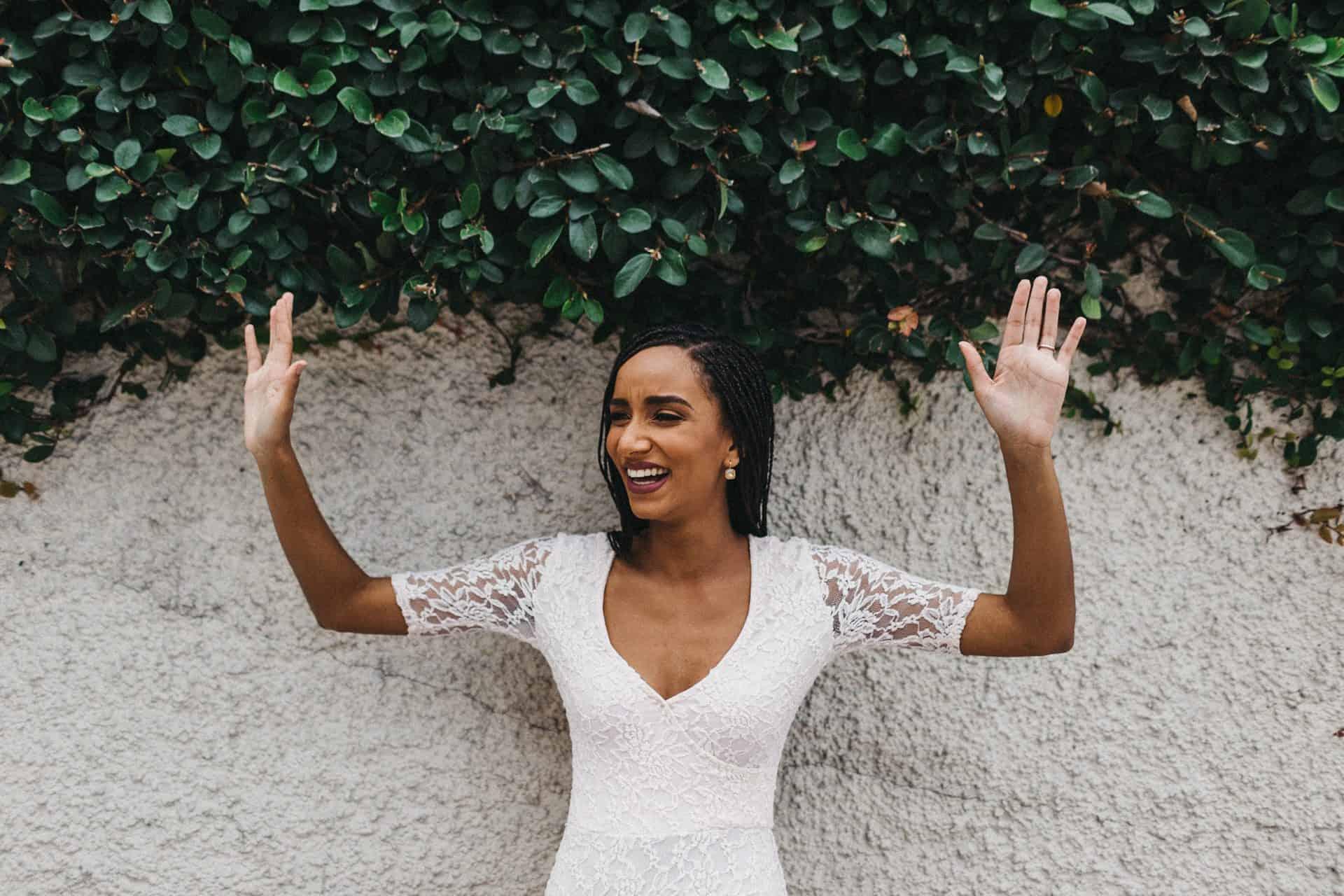 Soft embrace between a couple during an engagement session in Costa Rica, set against a lush, natural backdrop.