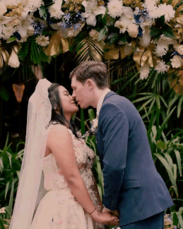Couple kissing during their wedding at La Paz Waterfall Gardens, Costa Rica